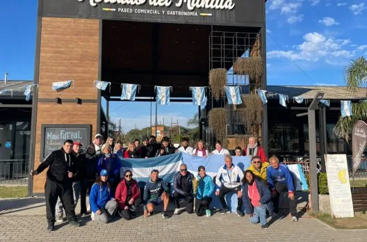La llama olímpica iluminó el Mercado del Munilla